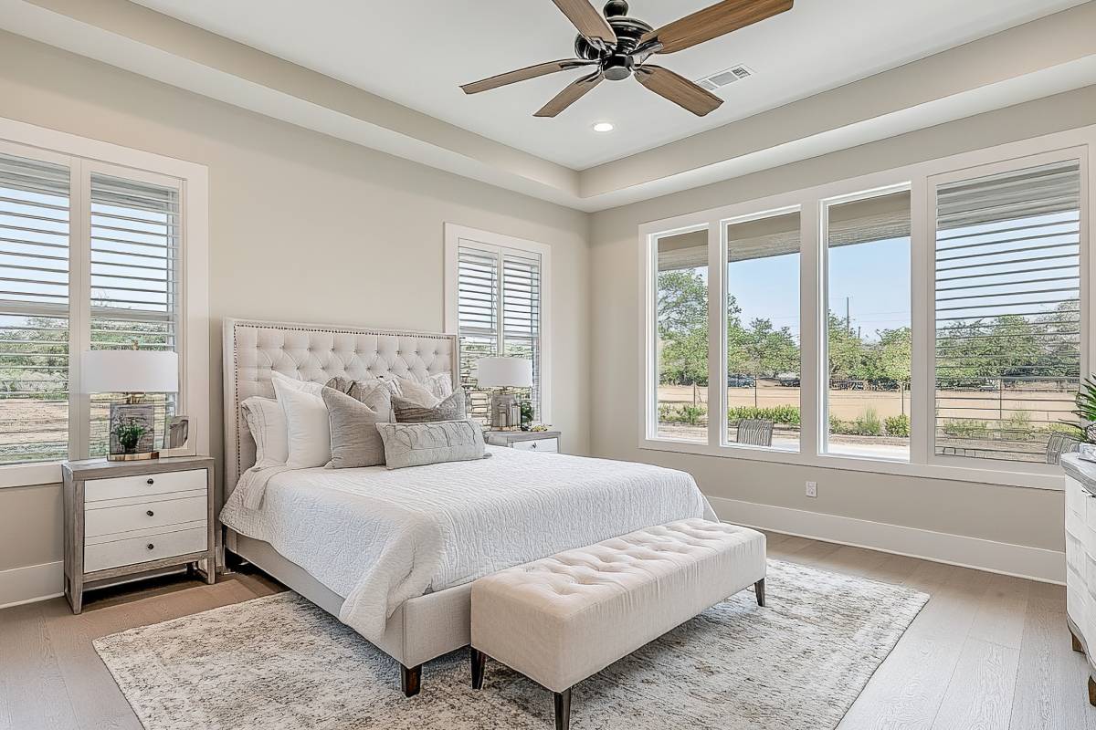 Custom master bedroom window treatments installed by Shadesmen