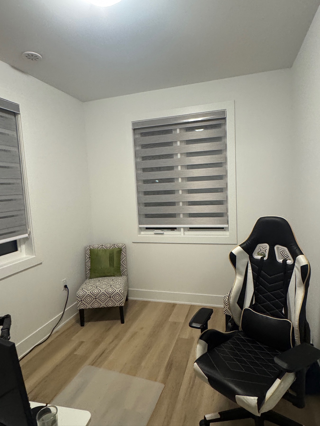 Zebra blinds installed on a home office window by Shadesmen